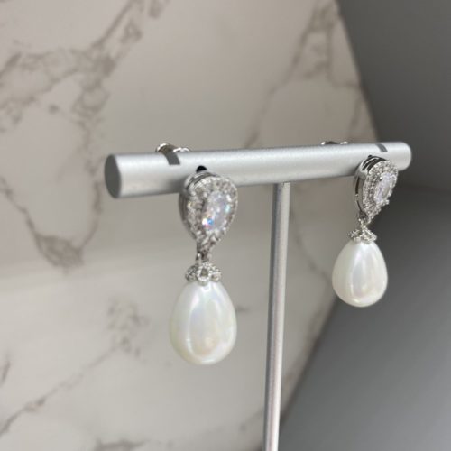 Clear Zircon stone detail on 925 silver hardware to the top with water pearl drop. Size width 1.0cm x height 2.9cm.