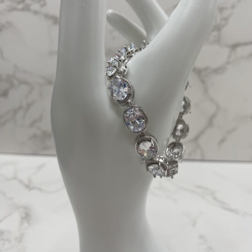 Our beautiful Phoebe bridal bracelet is the perfect accessory for our beautiful brides to be. Finish your look with this stunning silver plated 925 linked clear zircon stone bridal bracelet. Length of bracelet 17.5cm.