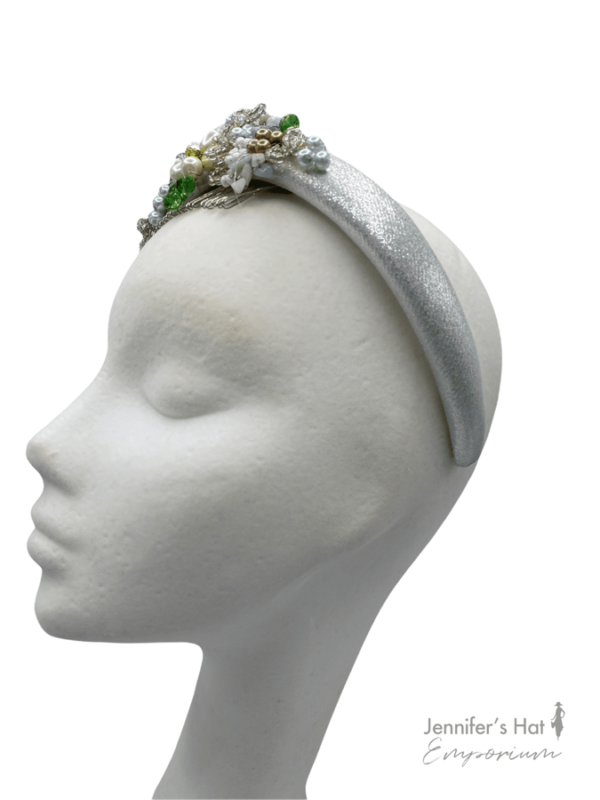 Silver banded headband crown with multicoloured beaded detail.