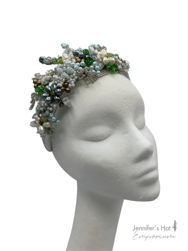 Silver banded headband crown with multicoloured beaded detail.