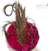 Pink velvet headpiece with stunning feather detail.