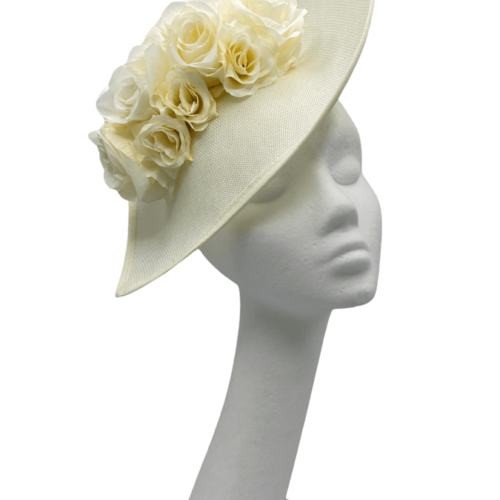 Large cream teardrop shaped headpiece on a headband with stunning cream flowers to compliment.