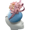 Blue velvet headpiece with baby pink flower detail and gold swirl.