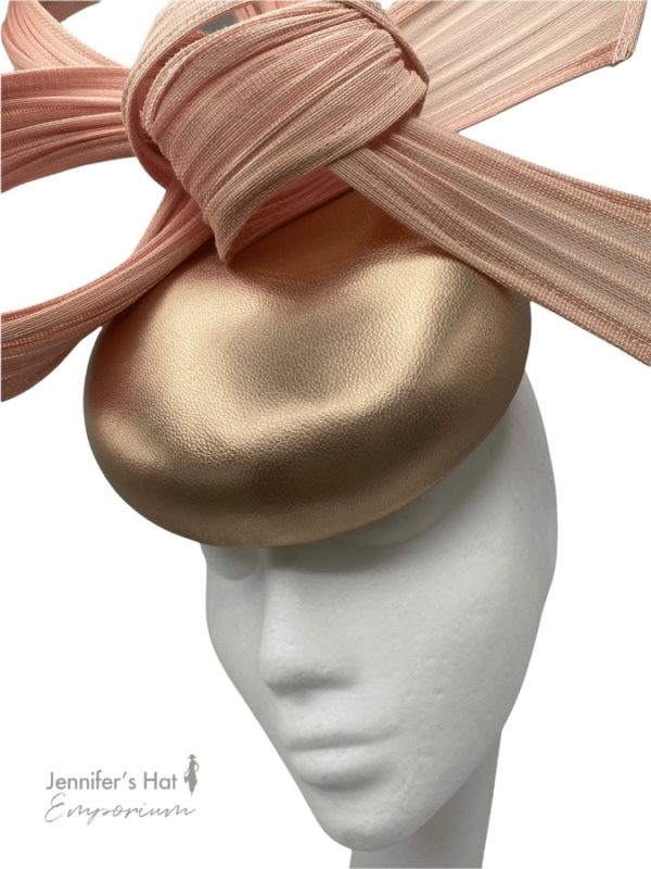 Rose gold base headpiece with blush pink swirl detail. Larger headpiece and quite a show stopper.