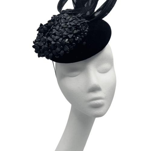 Black headpiece with stunning flower embellishment, finished with beautiful  swirl detail.