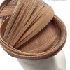 Nude/beige headpiece with interwoven fan detail.