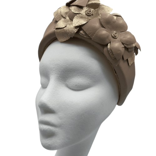 Nude leather crown headpiece with handmade gold leather flower detail.