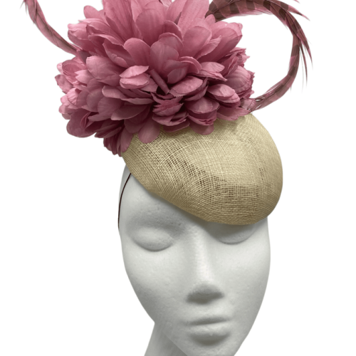 Cream/beige base with pink feathers and flowers to top.