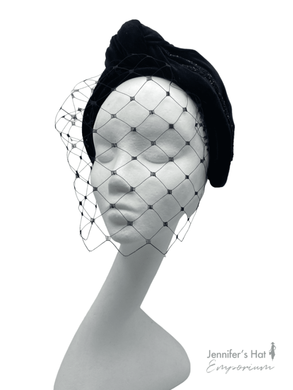 Black veiled turban crown.