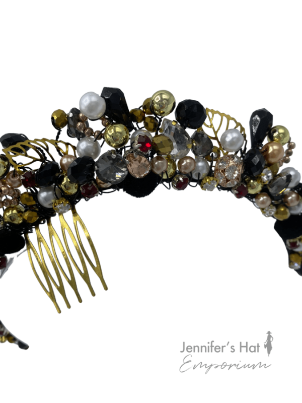 Black, gold and red stone beaded crown.