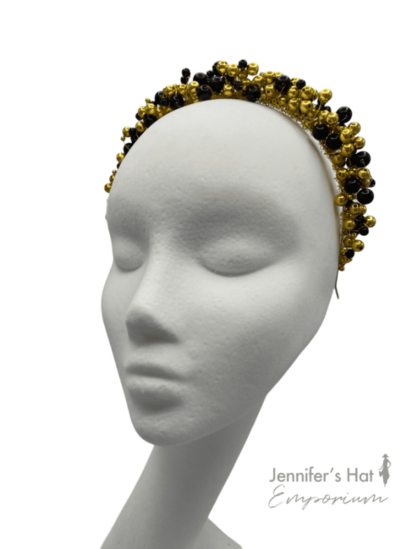 Black and gold hand beaded crown.