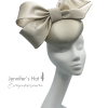 Stunning cream satin side bow headpiece.