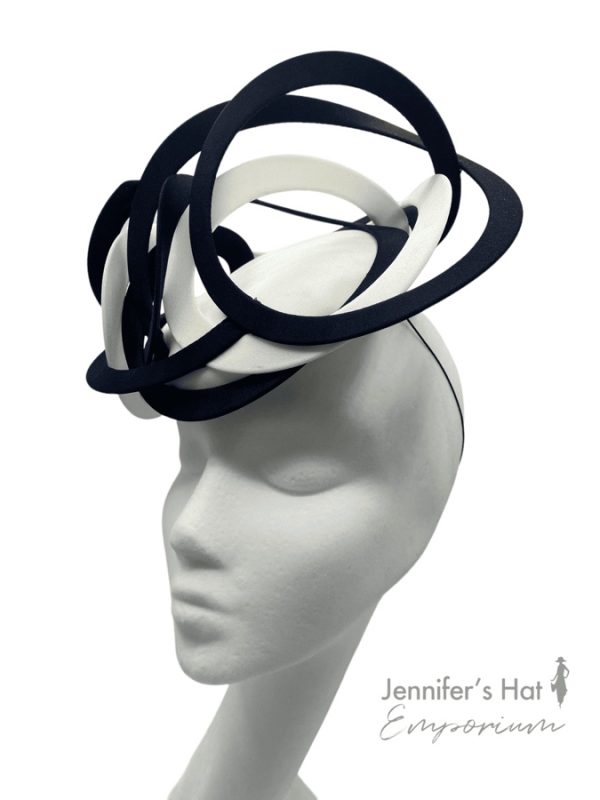 Stunning ivory and black swirl headpiece.