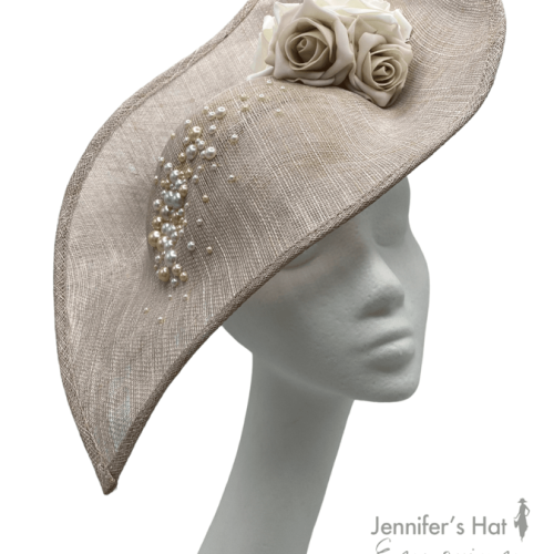 Large taupe coloured headpiece on a headband with pearl and flower detail, this headpiece is stunning.