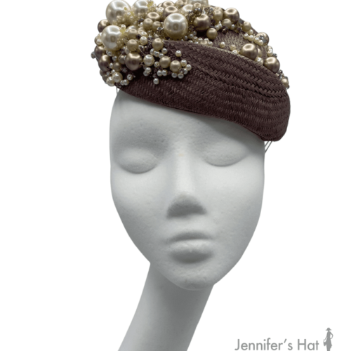 Brown/taupe headpiece with pearl and bead embellished detail.