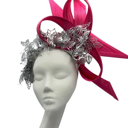 Pink structured headpiece with silver laser cut design detail.