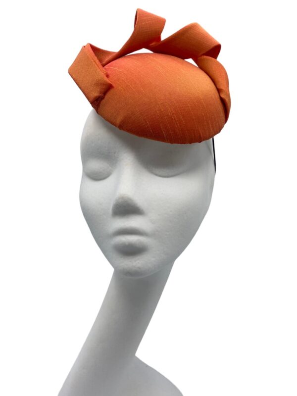 Small simple orange swirl detail headpiece.