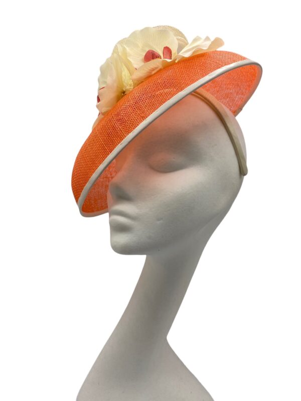Beautiful Coral and cream headpiece with orchid flower detail.