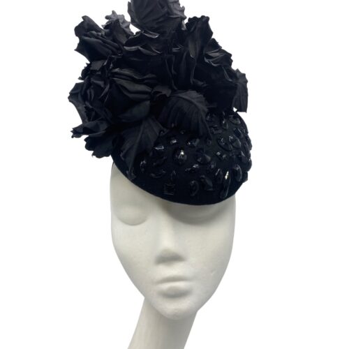 Black jewelled base headpiece with a gorgeous array of handmade silk flowers detail.