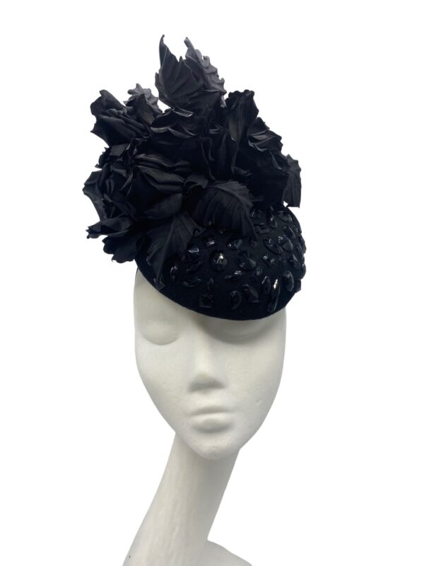 Black jewelled base headpiece with a gorgeous array of handmade silk flowers detail.