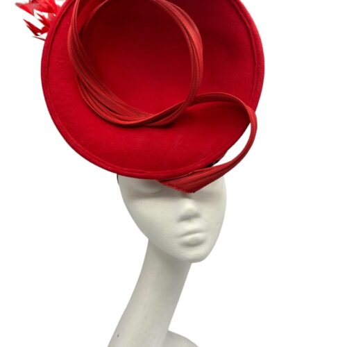 Red felt front facing red percher headpiece with stunning red leopard print detail to the base which can only be seen from side and back and finished with red flowers to the back.