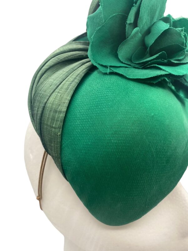 Silk crepe covered teardrop with green flower detail.