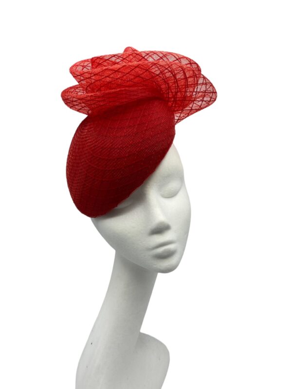 Red teardrop headpiece with stunning interwoven detail to the top.