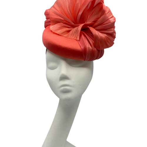 Beautiful coral headpiece with stunning silk abaca detail to the top.