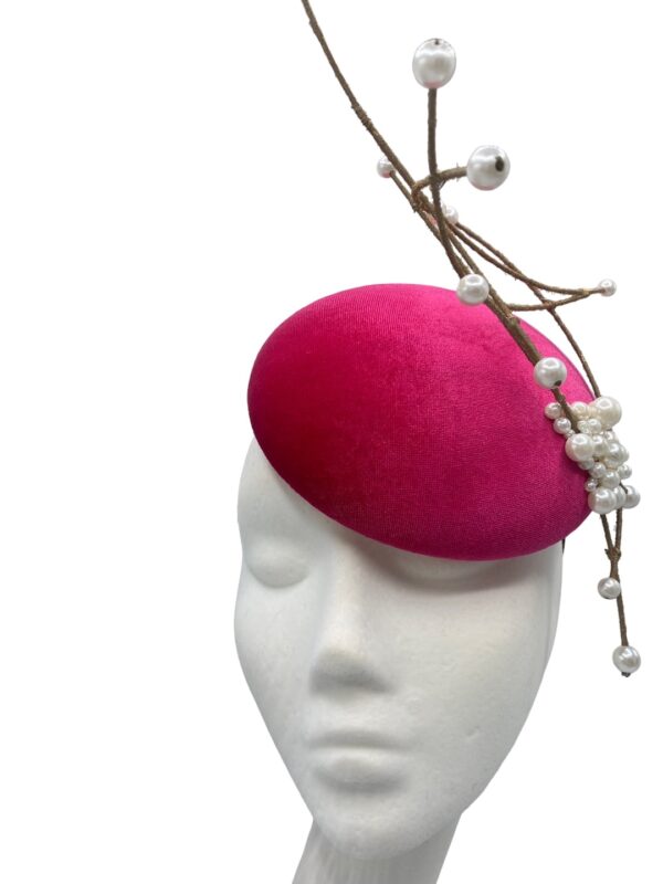 Stunning pink velvet base and finished with the most beautiful structured detail with pearl ends.