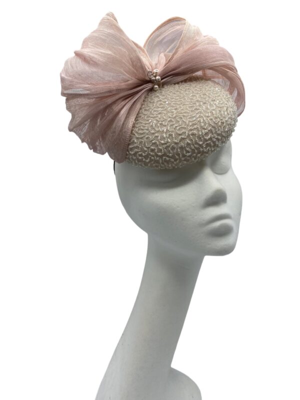 Ice pink pillbox headpiece with hand beaded overlay and beautiful nude/pink silk abaca bow detail.