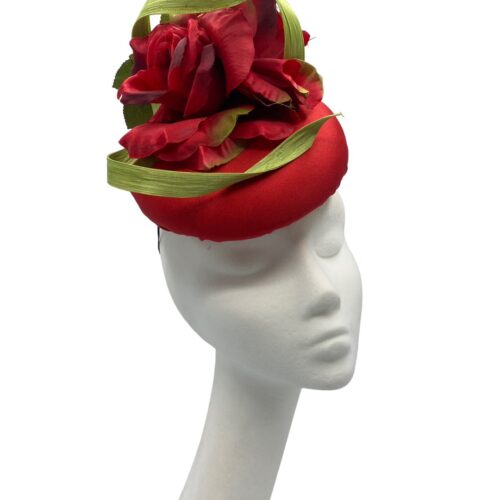 Fabulous coral red headpiece with red flowers covered with a green raw silk swirl detail.