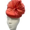 Beautiful coral headpiece with stunning silk abaca detail to the top.