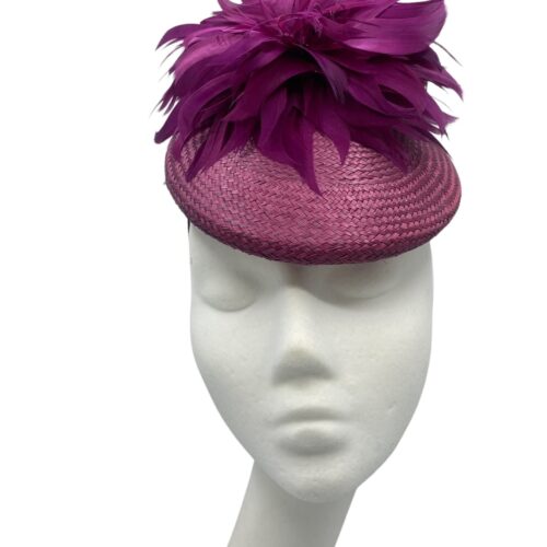 Pink/burgundy headpiece with stunning matching flower feather detail.