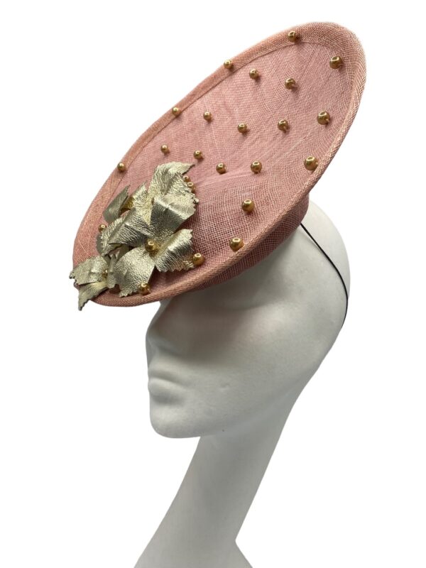 Blush pink percher headpiece with stunning gold beaded detail and gold flower petal to finish.