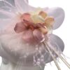 White base headpiece with stunning pink crin detail, with pink hydrangea finish.