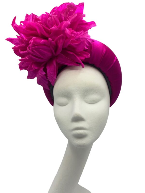 Vibrant pink headpiece crown with matching handmade silk flower detail to finish.