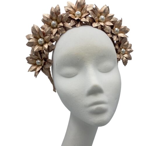 Stunning rose gold flower crown with pearl centre detail.