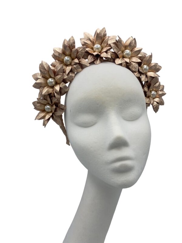 Stunning rose gold flower crown with pearl centre detail.