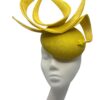 Yellow headpiece with structured swirl detail, small yellow bead detail to the base of the swirl.