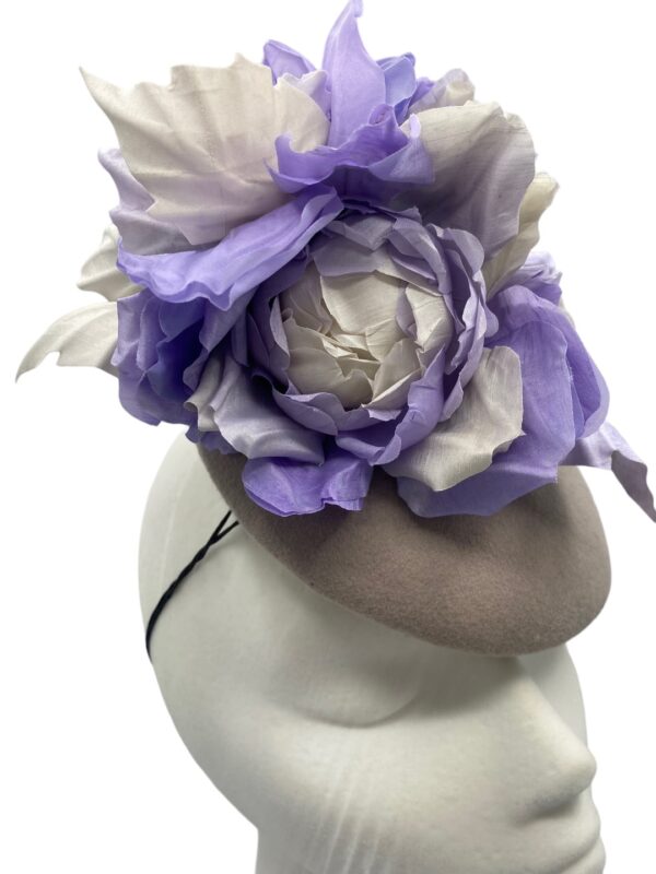 Stunning grey felt headpiece with beautiful handmade silk flower detail to the top.