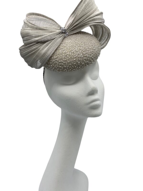 Stunning handbeaded grey/silver base with beautiful matching colour bow detail.