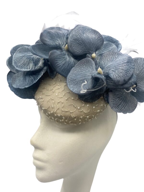 Grey/silver hand beaded base with stunning dark grey orchid petal detail to the top, making it quite a smaller size statement piece.