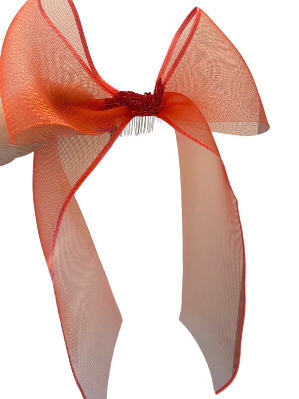 Stunning red bow with beaded centre detail.