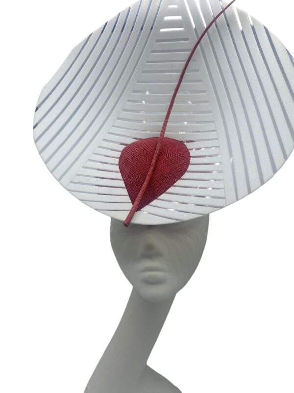 Stunning headpiece with red sinamay base and white/clear vinyl structure.
