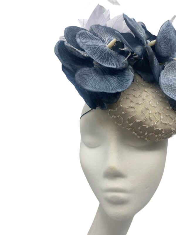 Grey/silver hand beaded base with stunning dark grey orchid petal detail to the top, making it quite a smaller size statement piece.