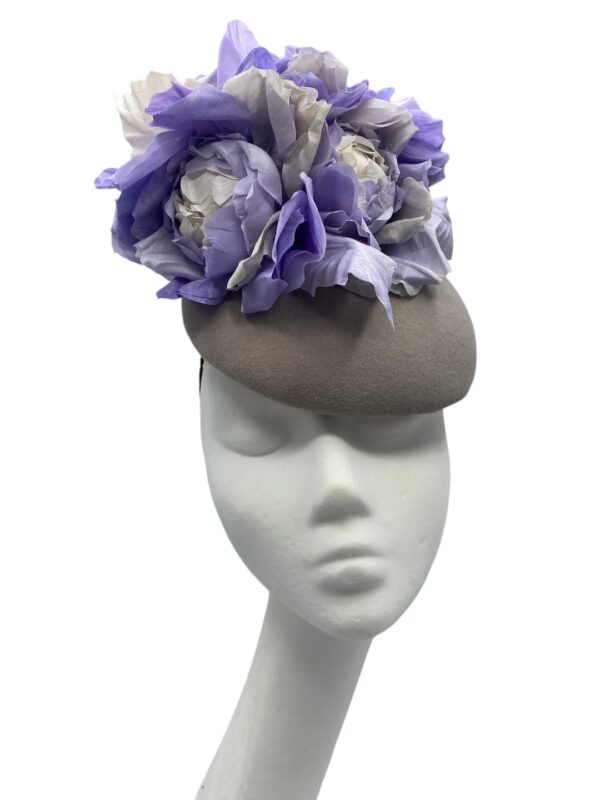 Stunning grey felt headpiece with beautiful handmade silk flower detail to the top.