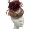 Rose gold sequinned headpiece with burgundy flowers & feather detail to finish.