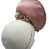 Rose gold sequinned percher headpiece with swirl detail to the top.