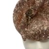 Rose gold sequinned percher headpiece with swirl detail to the top.