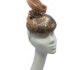Rose gold sequinned headpiece with swirl detail to the top.